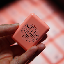 AON2 Aria speaker grille detail, held in a hand.